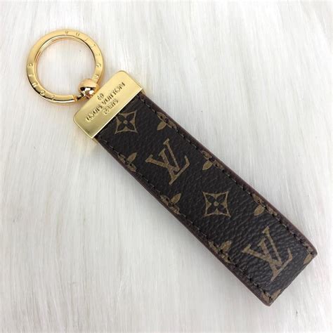 louis vuitton charm keychain replica|authentic louis vuitton key pouch.